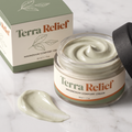 Terra Relief Magnesium Comfort Cream texture close-up, sage green packaging